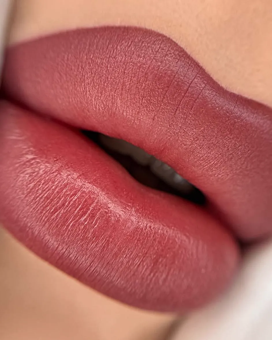 Healed lip blush in a deeper berry tone
